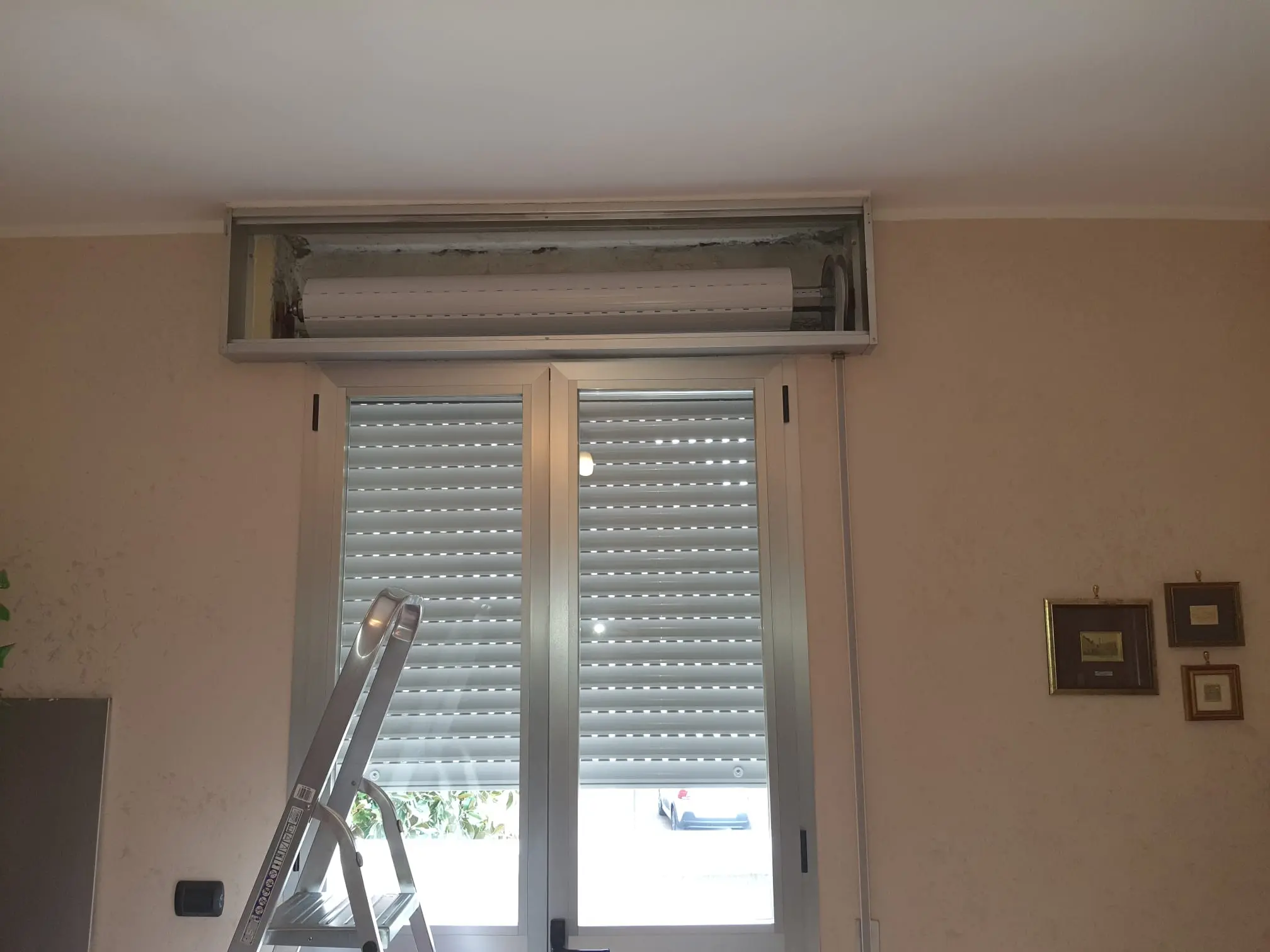 Cambio tapparella completa di rullo, puleggia e corda