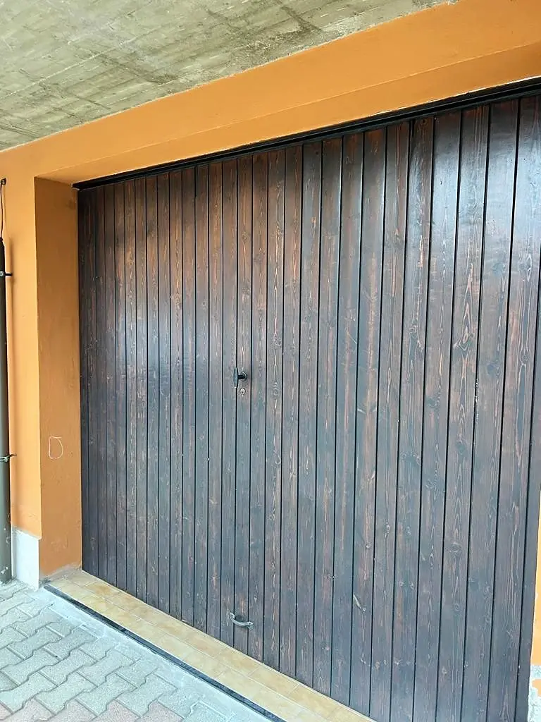 Riparazione porta basculante cambio cavo acciaio Riparazione porta basculante cambio cavo acciaio