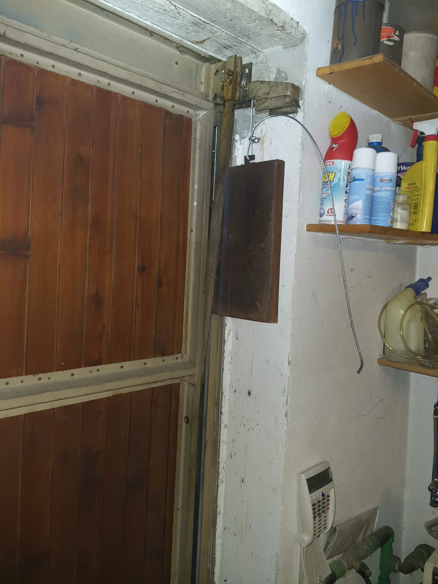 Riparazione porta garage basculante Riparazione porta garage basculante